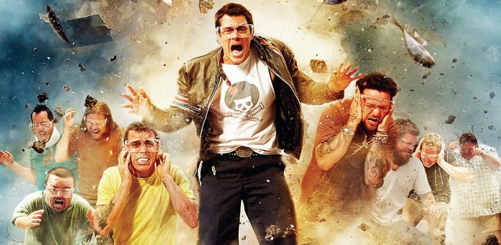 A group of men expressing shock and alarm amidst an explosive backdrop.