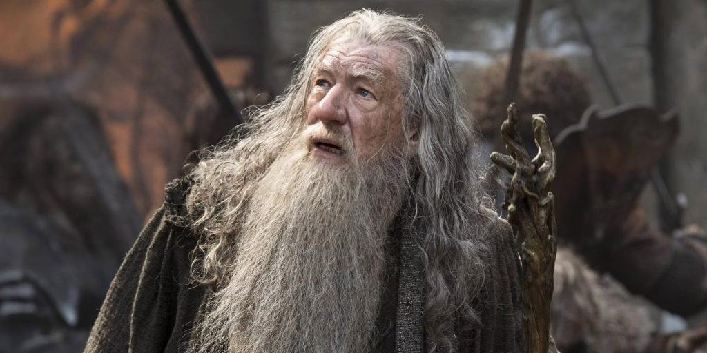 The hobbit with a long beard and a sword.