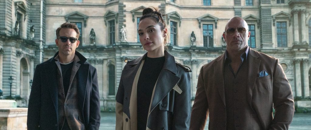 ‘RED NOTICE’ Review: ‘Don’t Leave That Notice On Red’