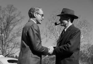 Robert Downey Jr is Lewis Strauss and Cillian Murphy is J. Robert Oppenheimer in OPPENHEIMER