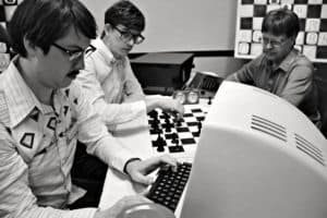 A group of men playing chess.