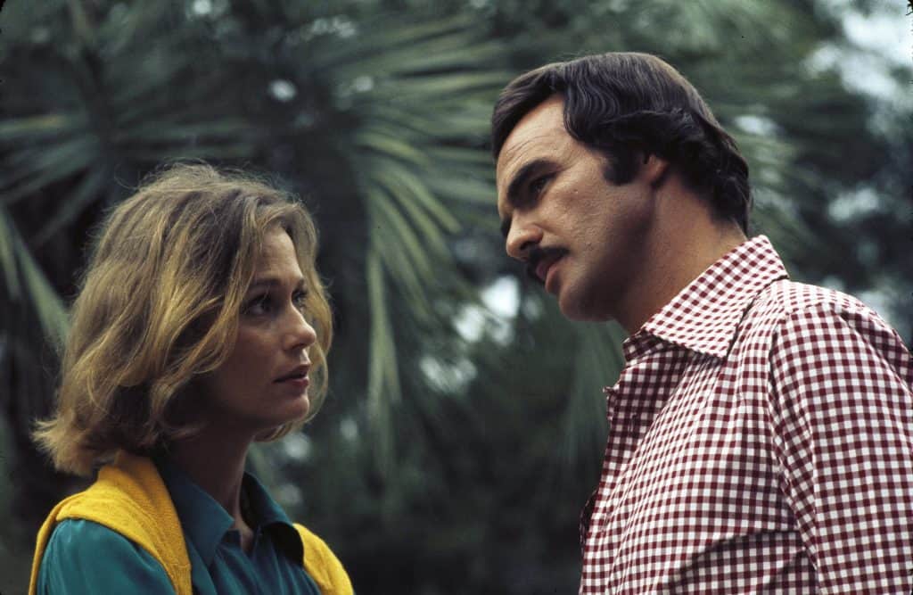 A man and woman standing next to each other.