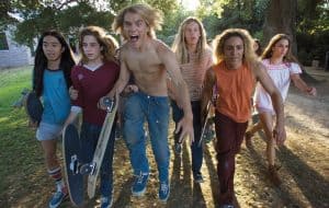‘Lords Of Dogtown’ Blu-Ray SteelBook Review – Catherine Hardwicke’s Compelling Exploration Of A Gritty Subculture A group of young people walking with skateboards.