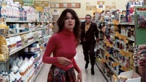 ‘Messiah Of Evil’ Blu-Ray Review – Cult Horror Favorite Is A Genuinely Chilling Nightmare A woman walking down a aisle of a grocery store.