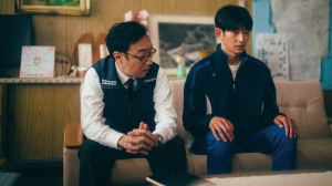 ‘Monster’ (2023) Blu-Ray Review – Hirokazu Kore-eda Comes Through With A Knockout New Feature Two men sitting on a couch in a living room.