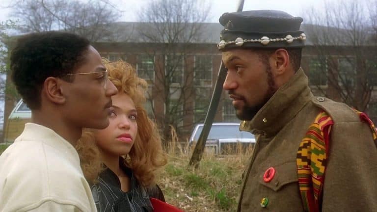 ‘School Daze’ 4K UHD Blu-Ray Review – A Wonderfully Messy & Ambitious Sophomore Joint From Spike Lee A man in a military uniform talking to a woman.