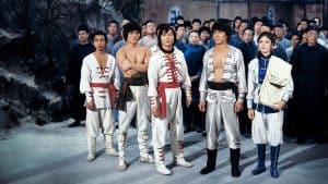 Shout! Studios Details The Fourth Installment Of Their Mighty Shaw Brothers Classics Blu-Ray Series Out Soon A group of people standing in front of a group of people.