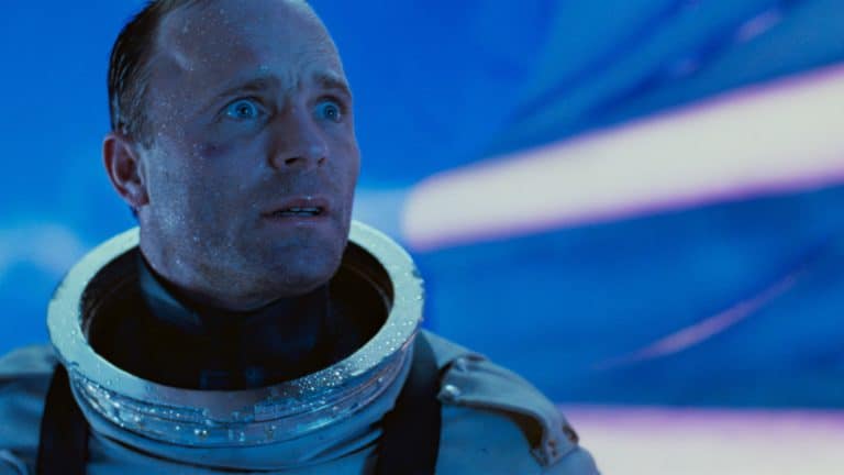 ‘The Abyss’ 4K UHD Blu-Ray Review – An Awe-Inspiring Journey Into The Deep A man in a space suit looking at the camera.