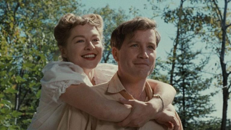 ‘The Apprenticeship Of Duddy Kravitz’ Blu-Ray Review – Success At All Costs A man and woman hugging each other in the woods.