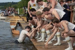 A group of men on a dock.