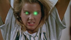 ‘There’s Nothing Out There’ Blu-Ray Review – Low-Budget Horror Satire Has Fun With Its Limitations A woman in a green shirt with green eyes.