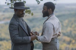 ‘Lawmen: Bass Reeves’ Blu-Ray Review – David Oyelowo Brings A Legend To Vivid Life Two men in hats standing next to each other.