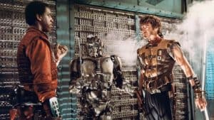 ‘The Ice Pirates’ Blu-Ray Review – Sci-Fi Spoof Is Dumb Fun Two men standing next to each other in a room.