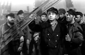 ‘The Sea Wolf’ Blu-Ray Review – Edward G. Robinson Electrifies In Paranoid Nightmare A black and white photo of a group of men on a ship.