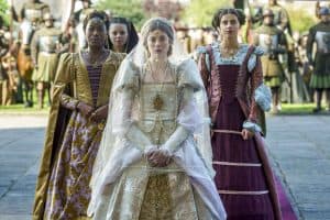 A group of women dressed in renaissance costumes.