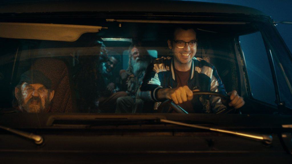 A man driving a car.