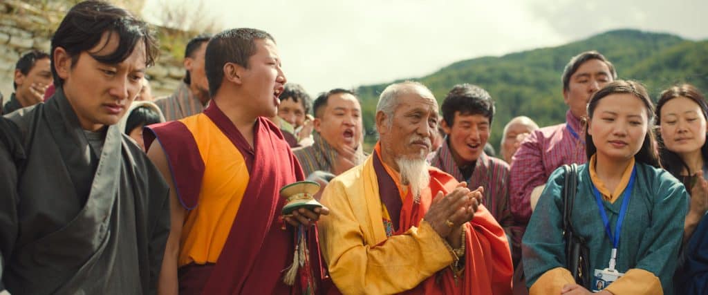 A group of people in tibetan robes.