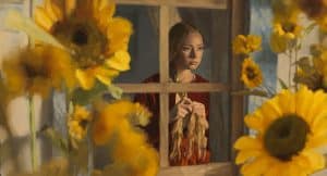 ‘The Peasants’ Blu-Ray Review – A Stunning Display Of Visual Artistry A woman looking through a window.