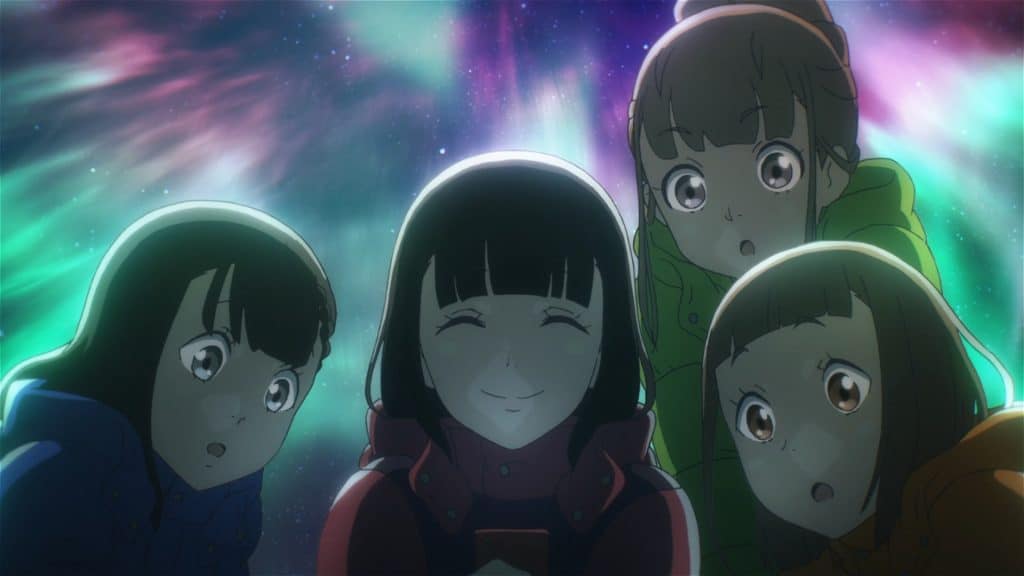 A group of anime girls standing in front of a starry sky.