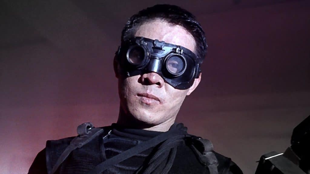 A man wearing a mask and goggles.
