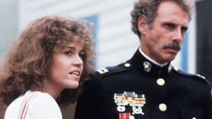 A man and woman in uniform standing next to each other.