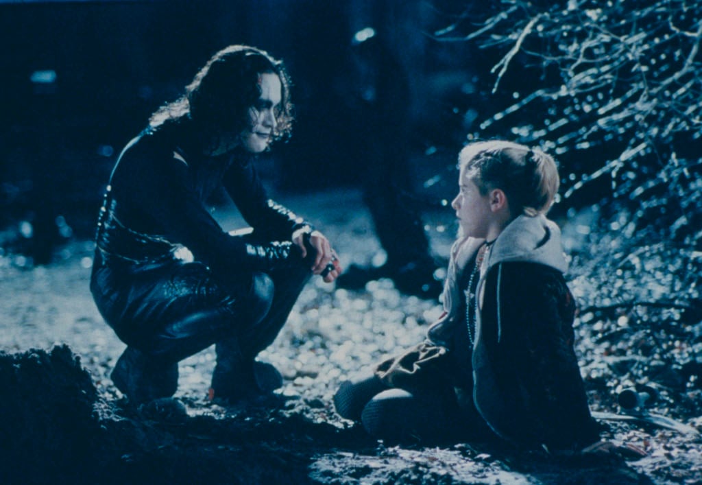 Brandon Lee talking to a girl in The Crow.