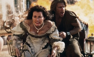 ‘Cutthroat Island’ 4K UHD Blu-Ray SteelBook Review – Notorious Bomb Is Better Than Its Reputation A man and woman riding in a carriage with smoke coming out of it.