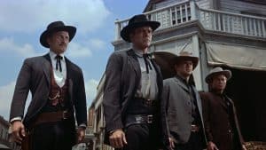 ‘Gunfight At The O.K. Corral’ 4K UHD Blu-Ray Review – A Thrilling Take On A Classic Western Showdown Three men in cowboy hats standing next to each other.