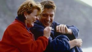 A man and woman laughing.