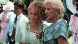 ‘Steel Magnolias’ 4K UHD Blu-Ray Review – Heartfelt Classic Still Delivers Humor & Pathos Two women standing next to each other at a party.