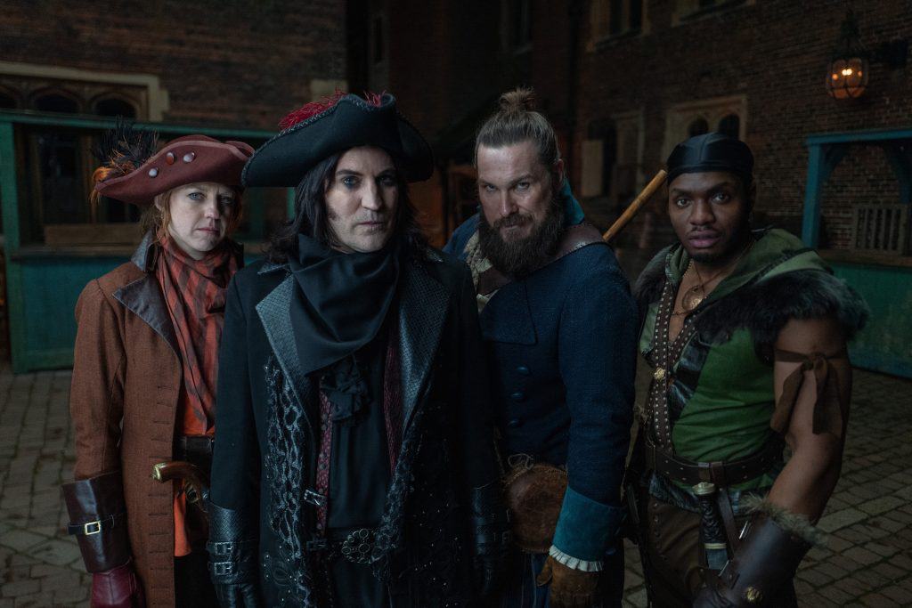A group of men dressed in pirate costumes.