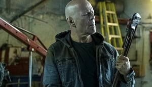 ‘Death Wish’ (2018) 4K UHD Blu-Ray Review – Eli Roth Offers A Hyper-Violent Update On The Material Man holding a large wrench with a focused expression.