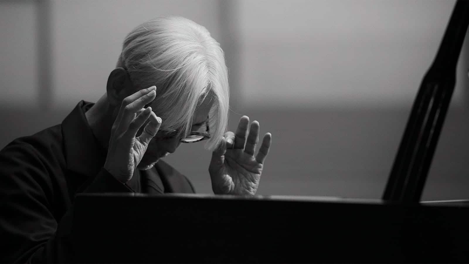 Pianist contemplating before a performance.