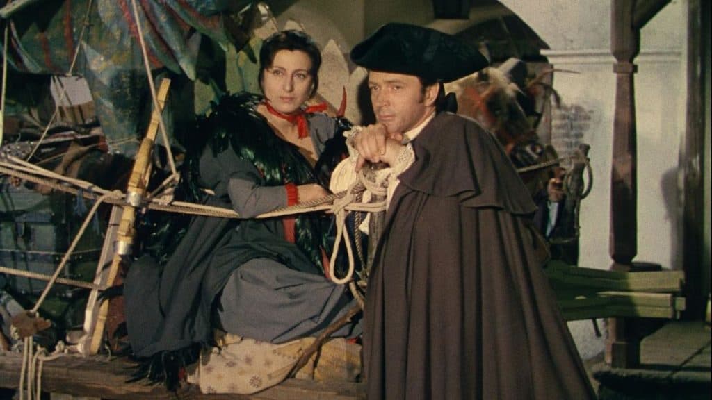 A man and woman in clothing.