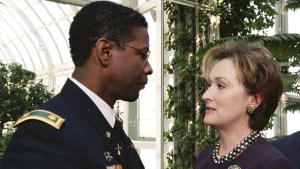 ‘The Manchurian Candidate’ (2004) 4K UHD Blu-Ray Review – Classic Thriller Gets A Star-Studded Remake Two individuals in conversation: a man in military uniform and a woman in a dress and pearl necklace.