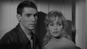 ‘The Road To Shame’ Blu-Ray Review – Gritty French Crime Drama Oozes Atmosphere A black and white photo of a man and woman standing next to each other.