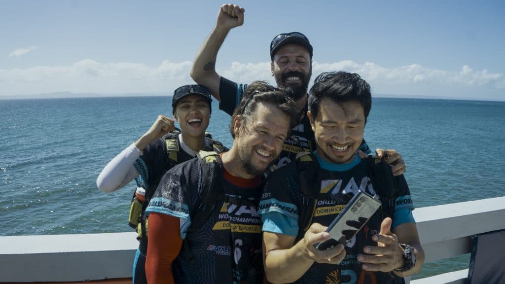 Mark Wahlberg Simu Liu, Nathalie Emmanuel, and Rob Collins in Arthur the King | Image via Lionsgate