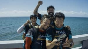 Mark Wahlberg Simu Liu, Nathalie Emmanuel, and Rob Collins in Arthur the King | Image via Lionsgate
