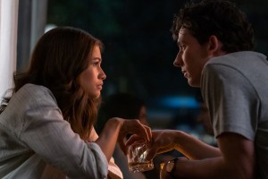 ‘Challengers’ Blu-Ray Review – An Endlessly Entertaining Erotic Sports Drama A man and a woman with a drink between them, engaged in a serious conversation at night.