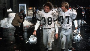 ‘North Dallas Forty’ 4K UHD Blu-Ray Review – A Brutal Look At The Vicious Business Of Football Two actors portraying football players walking off the field with dirtied uniforms in a movie scene.