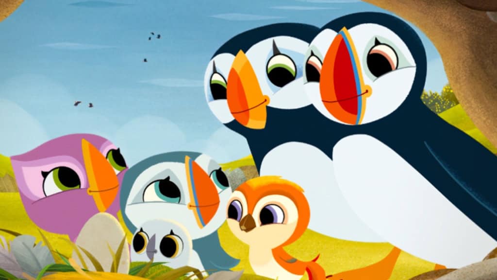 Colorful animated birds with large eyes and distinctive beaks in a lively conversation in a grassy landscape.