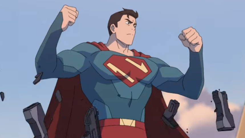 Animated character in a blue suit with a red cape and an emblem on the chest, standing with clenched fists as debris falls around.