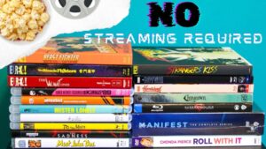 No Streaming Required: Physical Media Spotlight For The Week Of June 25th A stack of various DVD cases with a bowl of popcorn and film reel in the top left corner. Text at the top reads "No Streaming Required.