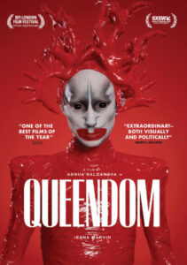 A film poster for "Queendom" featuring a person in red body suit and elaborate red headpiece. The background is red with film festival laurels and reviews praising the film’s visual and political impact.