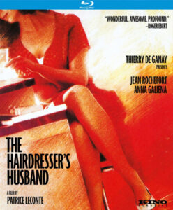 Blu-ray cover for "The Hairdresser’s Husband." Features a woman in a red dress with legs crossed, a review quote by Roger Ebert, and names of actors Jean Rochefort and Anna Galiena. Directed by Patrice Leconte.