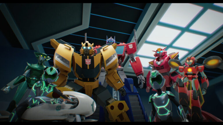 ‘Transformers: Earthspark’ Season 2 Part 1 Review – Taking A Step Backward And Paying For It A group of robot characters, varying in colors and designs, standing together in a futuristic room with a grid-like ceiling.