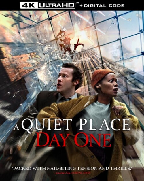 Cover of "A Quiet Place: Day One" showing two characters looking distressed while running from impending chaos. The background depicts a destructive scene through a cityscape with shattered glass.