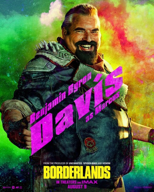 A promotional poster for the movie Borderlands featuring Benjamin Byron Davis as Marcus. The actor is smiling against a colorful, smoky background. Text mentions the movie's release date: August 9.