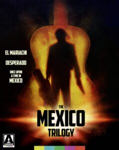 A silhouetted figure with a guitar case and gun inside a glowing guitar shape. Text: "El Mariachi, Desperado, Once Upon a Time in Mexico - The Mexico Trilogy." Arrow Video logo at bottom left.