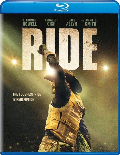 Blu-ray cover of "Ride" showing a cowboy with a clenched fist raised, amid a dimly lit rugged setting. The tagline reads, "The toughest ride is redemption." Cast names are listed at the top.
